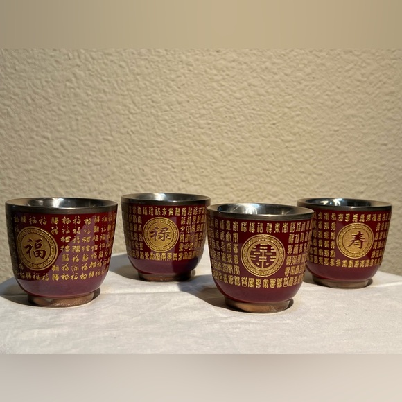 Elegant Red and Gold Decorative Cups
